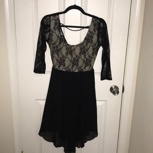 Mid length flowy black lace dress